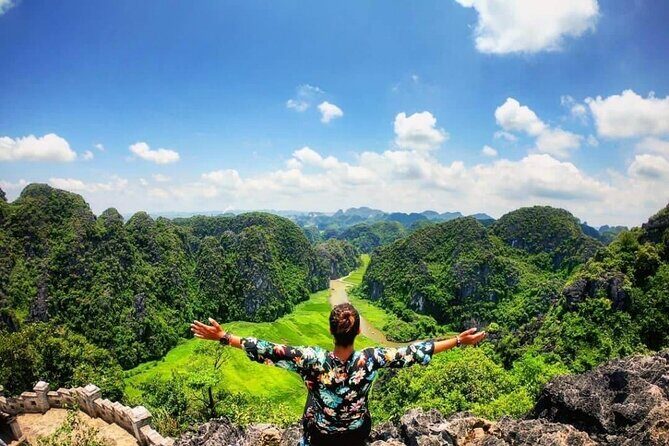 Ninh Binh 1 day tour UNESCO World Heritage: BAI DINH PAGODA - TRANG AN -MUA CAVE - Climb to Mua Cave for Panoramic Views