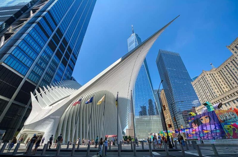 NYC: Financial District Guided Walking Tour English-Spanish - Key Points
