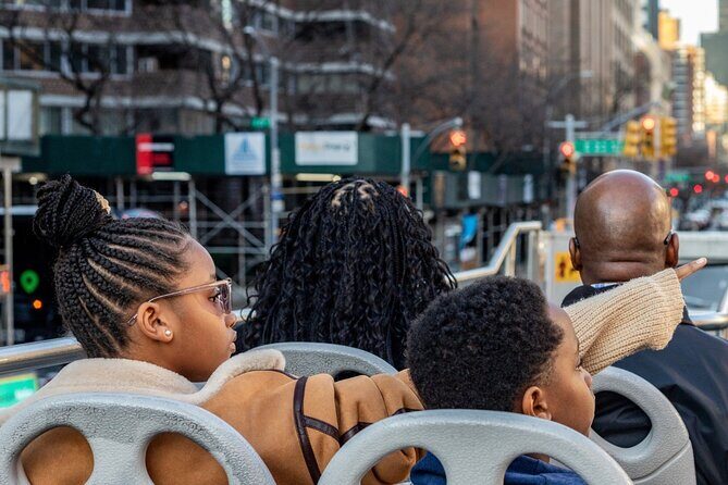 NYC Night Bus Sightseeing Tour with Free Statue of Liberty Cruise - The Sum Up