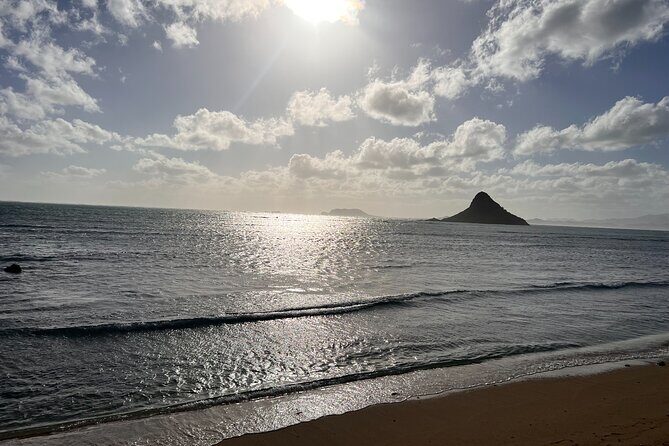 Paddle boarding and hiking adventure at Mokoli'i Island. - Key Points