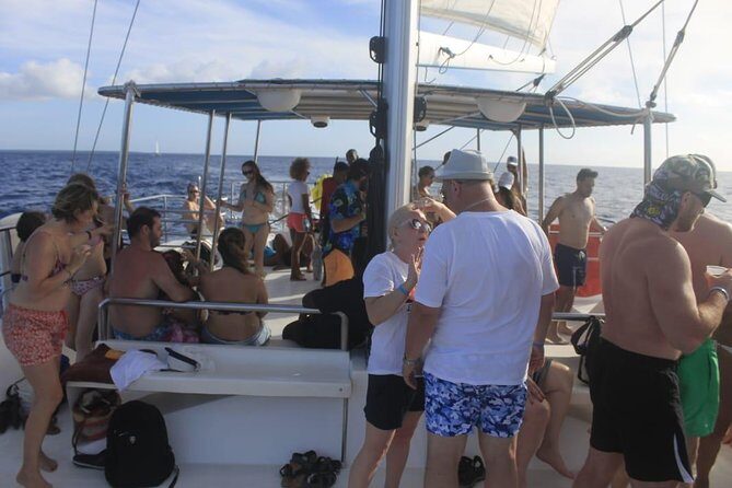 Party boat in Catamaran with Open Bar Only Adults + Snorkeling - The Sum Up