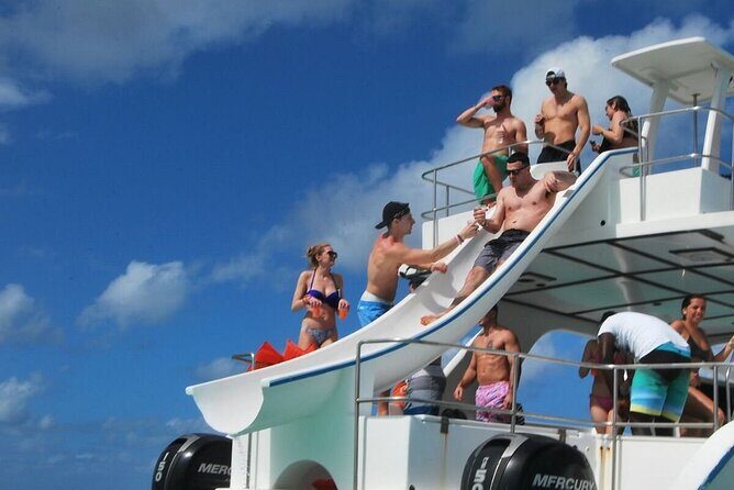 Party Boat /View Dolphins / Snorkling /Free Drinks and Transportation - What to Expect on the Tour