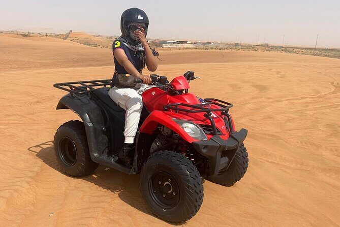 Premium Desert Quad (ATV) Bike Ride Adventure & Sand boarding - The Thrills: Dune Bashing, Quad Biking, and Sandboarding