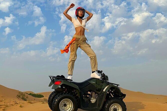 Premium Evening Desert Safari with Quad Bike, Camel Ride and BBQ Dinner - The Sum Up