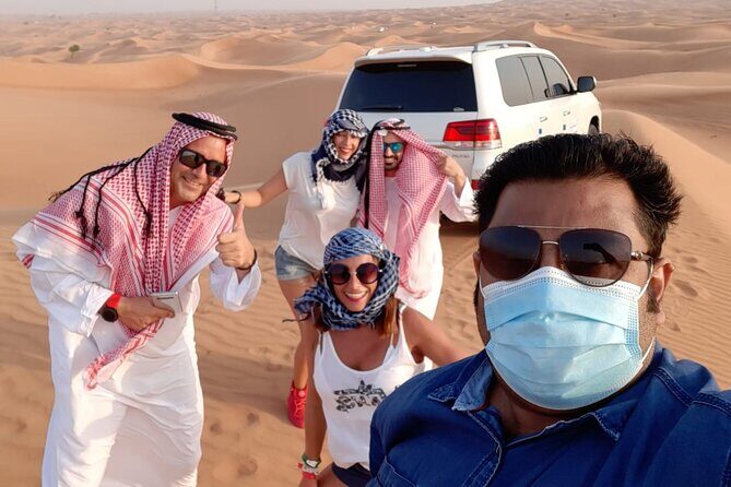 Premium Red Dune Safari, Sandboarding, Camel Ride, 5* BBQ Dinner - The Sum Up