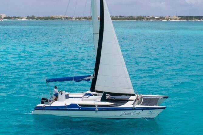Private Catamaran to Isla Mujeres! Drinks, Party & Adventure - Key Points