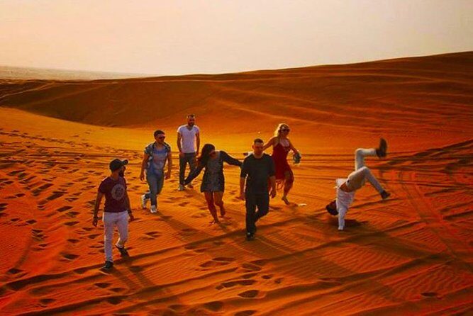 Private Desert Safari Red Dune with BBQ, Sand Boarding and Camel Ride - The Real Traveler Experience