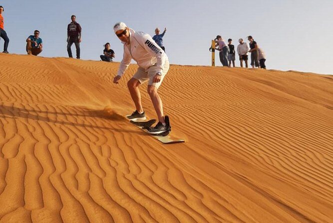 Private Desert Safari Red Dune with BBQ, Sand Boarding and Camel Ride - The Sum Up