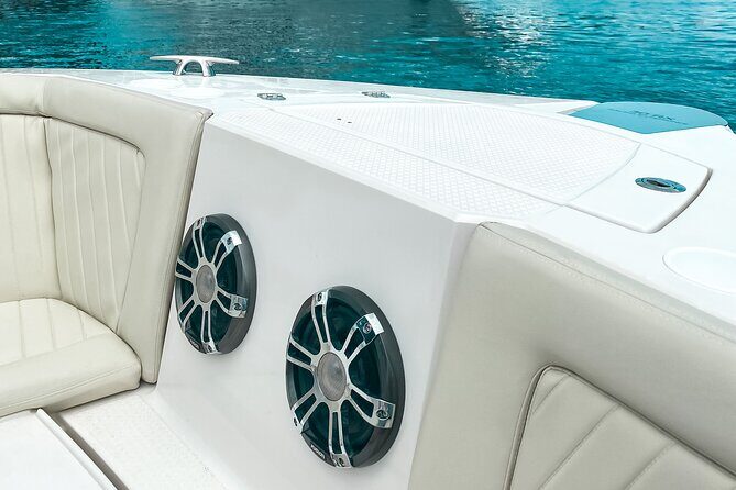 Private Full-Day Speed Boat Tour of St. Martin with Luxury Lunch - Third Stop: Grand Case and Creole Rock
