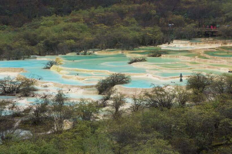 Private Huanglong Park day tour by bullet train from Chengdu - Reaching Huanglong: The Park and Its Highlights