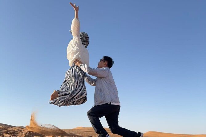 Private Morning Desert Safari With Sandboarding and Camel Ride - Sandboarding: A Thrilling Sport on Dunes