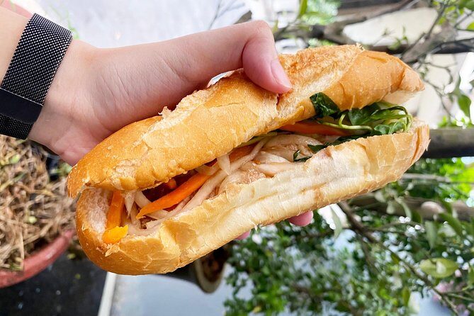 Private Street Food Tour by Scooter in Ho Chi Minh City - Food and Cultural Highlights