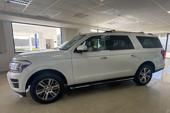 Private SUV RoundTrip from Airport to Hotels Pacific Area Zone 4 - Key Points