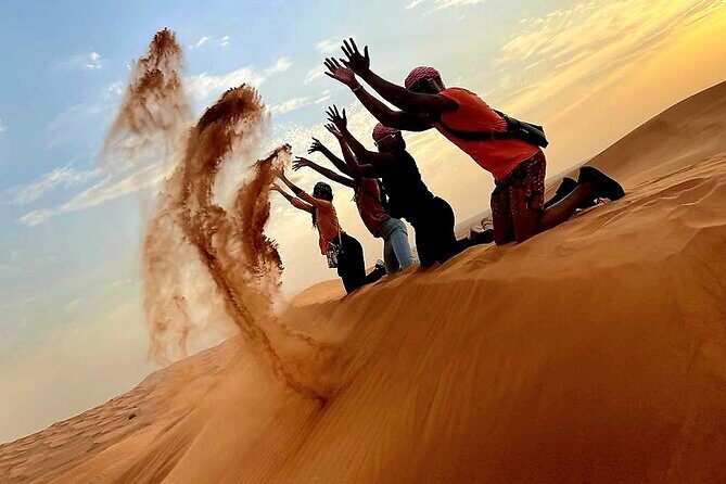 Professional Desert Safari with Camel Ride & BBQ in Bedouin Camp - First Stop: Dune Bashing and Sandboarding
