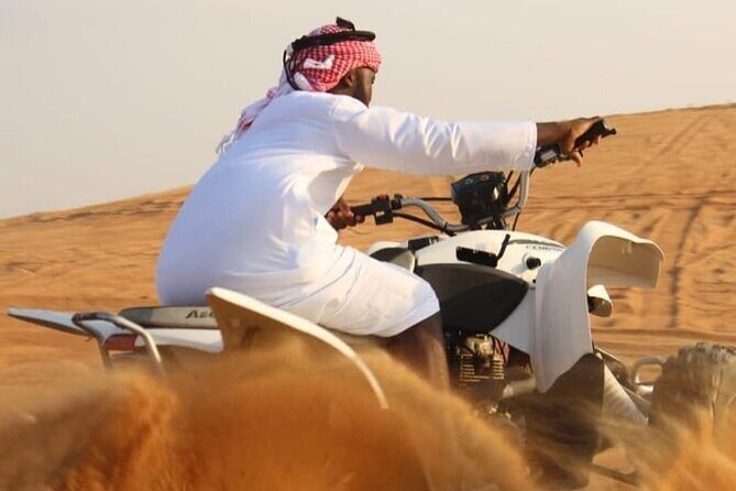 Quad Bike Dubai Desert Safari with BBQ Dinner Sandboard and Show - Key Points