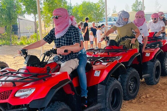 Quad Bike Tour with Camel Ride, Sandboarding, BBQ & Live Shows - Key Points