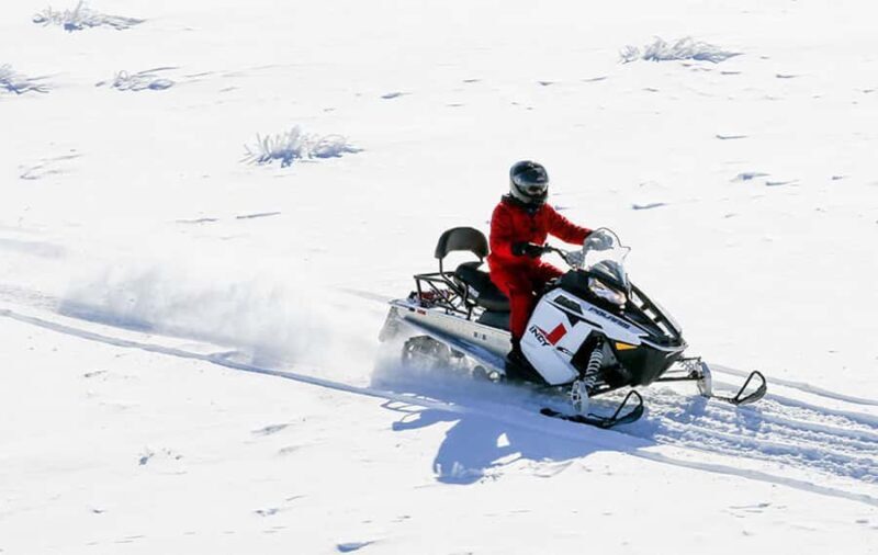 Queenstown: Snowmobiling Experience with Helicopter Flight - An Overview of the Experience