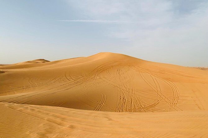Red Dunes Safari By Quad Bike, Sandboarding, Camel Ride & BBQ Dinner - Key Points