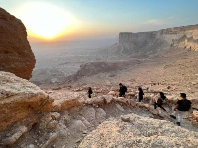 Riyadh: Edge of the World Hiking, Camel Ride, and Cave Tour - Key Points
