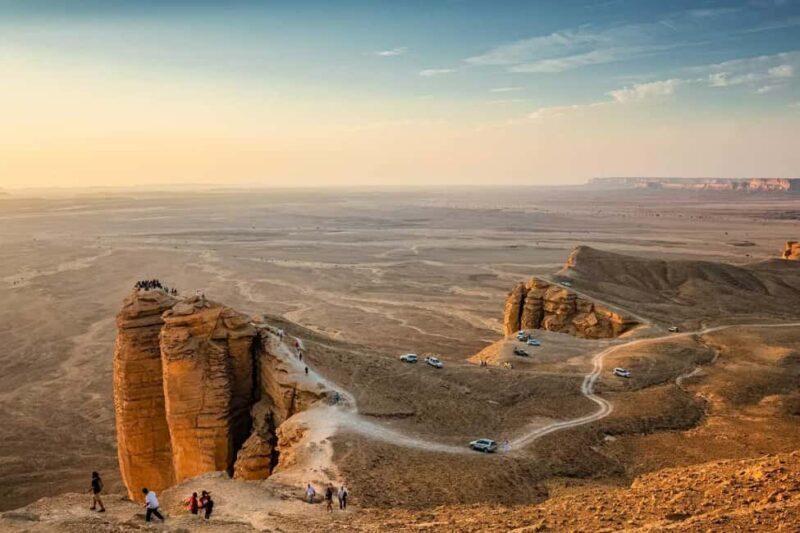 Riyadh: Edge of the World Hiking, Camel Ride, and Cave Tour - Discovering the Edge of the World: A Balanced Look