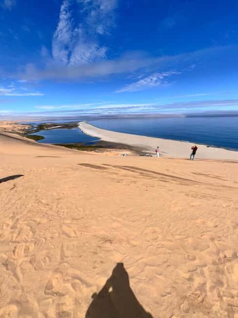 Sandwich Harbour Experience Where Dunes Kiss the Ocean - Discovering Namibia’s Coastal Marvel: Sandwich Harbour Experience – Where Dunes Kiss the Ocean