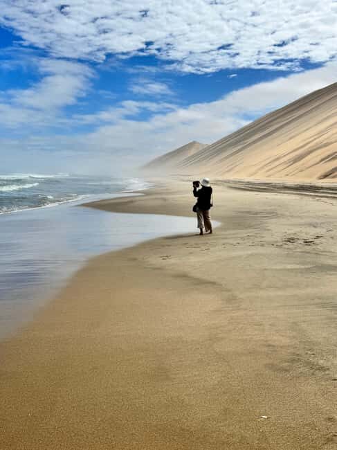 Sandwich Harbour Experience Where Dunes Kiss the Ocean - The Sum Up