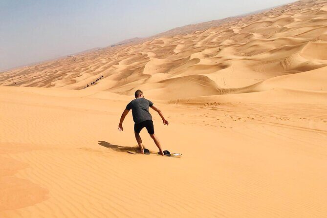 Self Drive Quad Bike in Open Desert With Sand Boarding and Camels - Return and Comfort