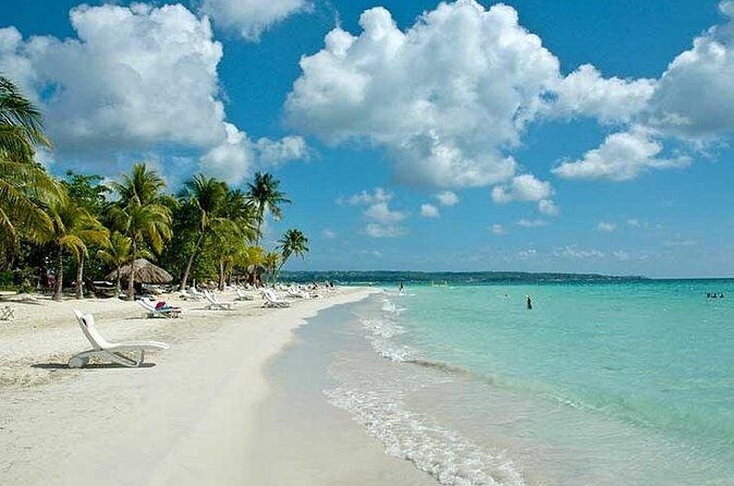 Seven Mile Beach and Ricks Cafe Private Tour - Authentic Experience and Value