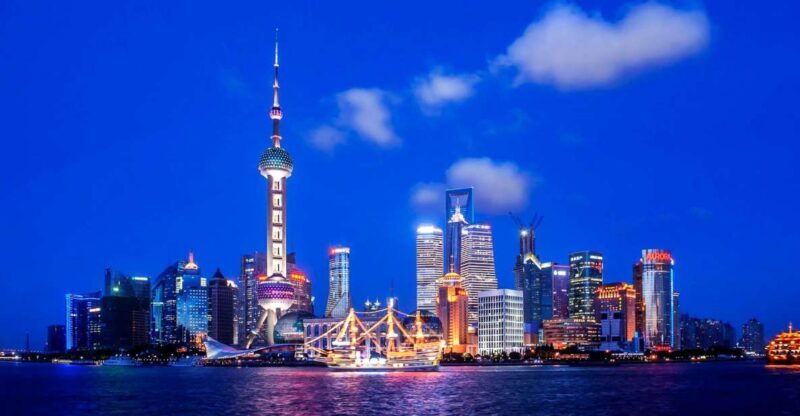 Shanghai: Night River Cruise Tour with Xinjiang Style Dining - Discovering Shanghai by Night: What to Expect
