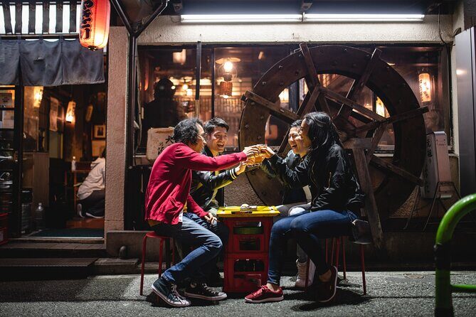 Shibuya by night in Small Groups: Neon Lights and Local Flavors - Key Points
