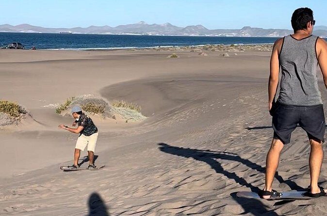 Slide into the sunset by Sandboarding in Las Dunas Del Mogote - Who This Tour Is Perfect For