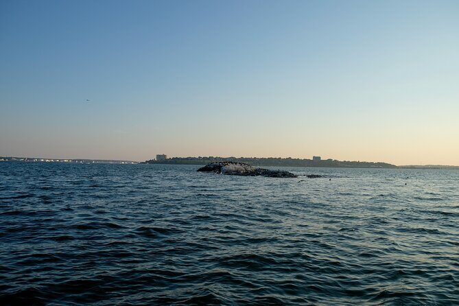 Small Group Sunset Lighthouse Boat Cruise With Local Drinks - An In-Depth Look at the Sunset Lighthouse Boat Cruise