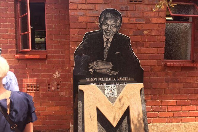 Soweto and Apartheid Museum Day Tour - Visiting the Hector Pieterson Memorial