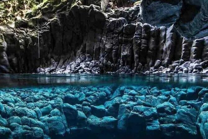 Stone Town Tour; Kuza Cave; Blue Lagoon; Starfish Adventure; The Rock Restaurant - Snorkeling at Blue Lagoon: Underwater Paradise