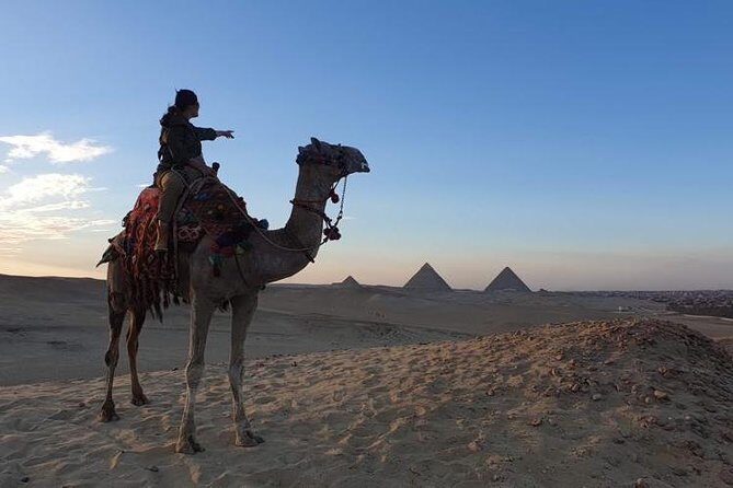 sunset at Giza pyramids by camels - Why You’ll Love This Experience