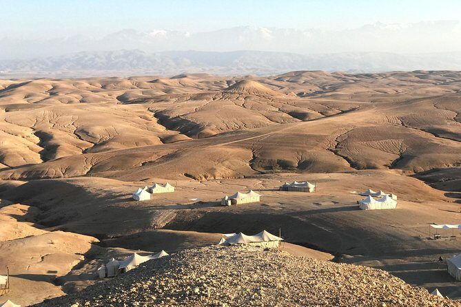 Sunset Camel ride Agafay desert including dinner and transport - FAQs