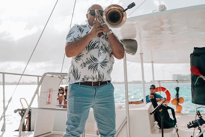 Sunset Catamaran to Isla Mujeres + Transportation from Cancún - A Scenic Journey into the Caribbean Sunset