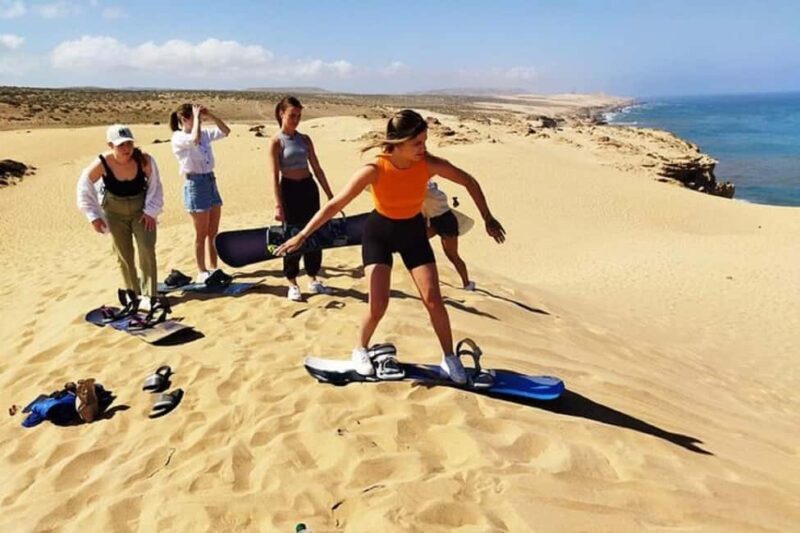Sunset Desert Camel Ride with Sandboarding and BBQ Dinner - The Experience: What Travelers Say