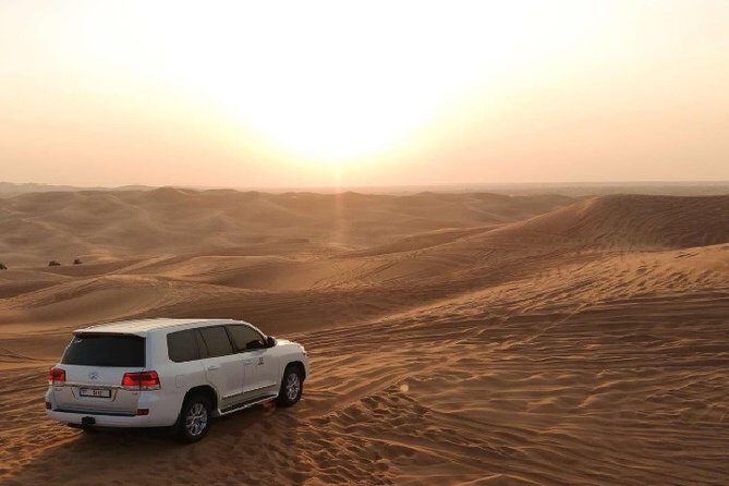 Sunset Desert Safari With BBQ Dinner, Camel Ride, Belly Dancing from Dubai - Discover the Magic of Dubai’s Desert Sunset Safari