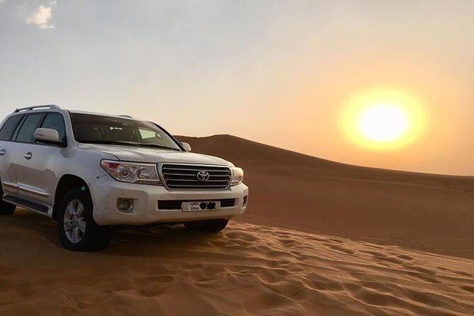 Sunset Desert Safari With BBQ Dinner, Camel Ride, Belly Dancing from Dubai - Key Points
