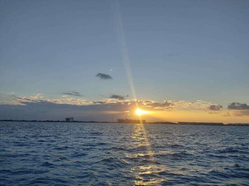 Sunset Sailing to Isla Mujeres with Cancún Transfer - Key Points