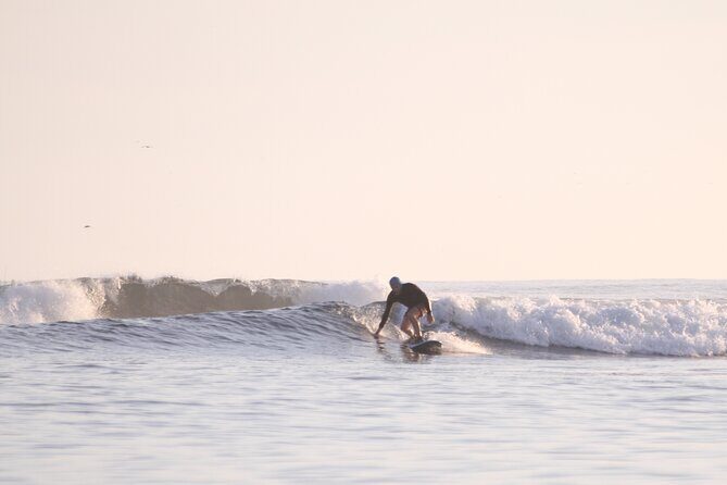 Sunset Surfing Trip to Secluded Beach with Certified Instructors - An Introduction to the Sunset Surfing Experience