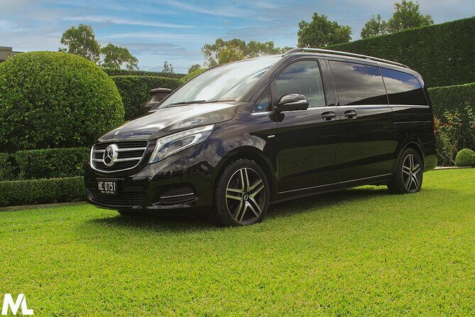 Sydney Airport to Sydney CBD shared ride seat in vehicle shuttle transfer - The Sum Up