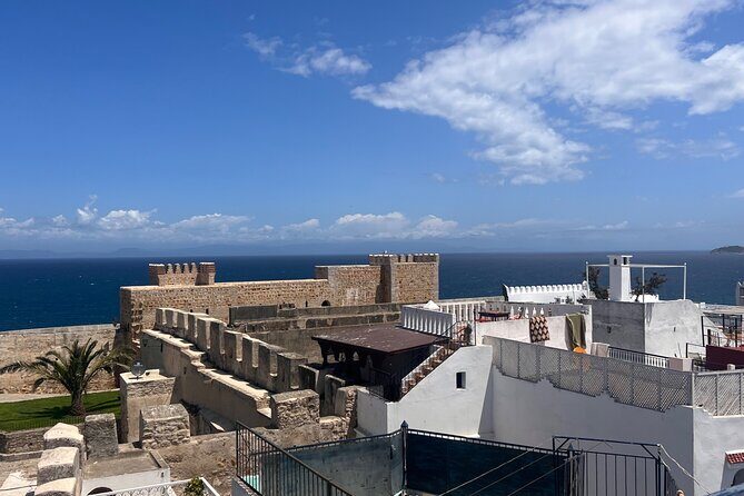 Tangier tours with female tour guide Abir - Camel Ride at Achakar Beach