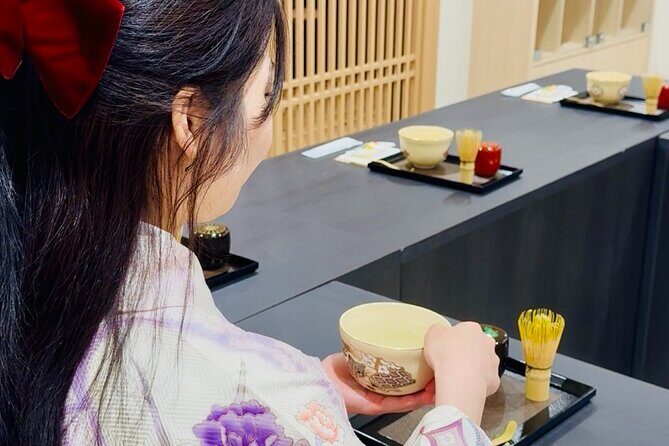 Tea and Calligraphy Session at a Table in Osaka - Key Points