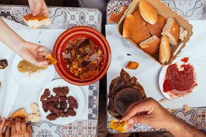 The 10 Tastings of Marrakech With Locals: Private Food Tour - Market Exploration and Iconic Landmarks