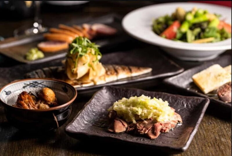 Tokyo: Izakaya Bar Experience at Kuuraku Ginza Reservation - Key Points