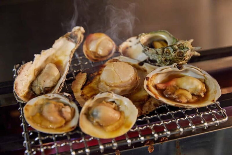 Tokyo: Japanese Experiece Dinner with Diving Ama Performance - Key Points