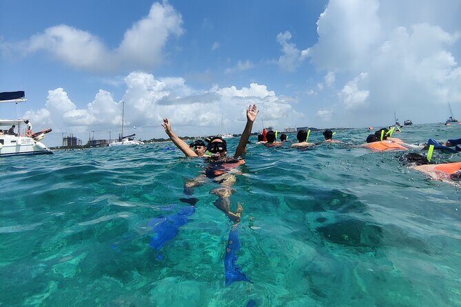 Top Isla Mujeres Catamaran Tour with Snorkel Open Bar and Buffet lunch - The Journey to Isla Mujeres