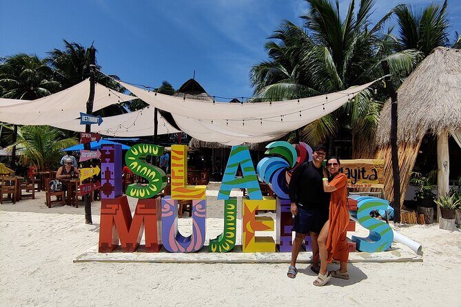 Top Isla Mujeres Catamaran Tour with Snorkel Open Bar and Buffet lunch - Considerations and Caveats